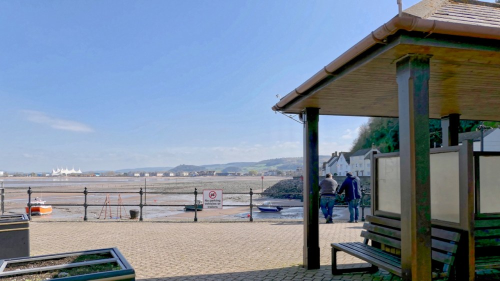 Two men overlooking harbour